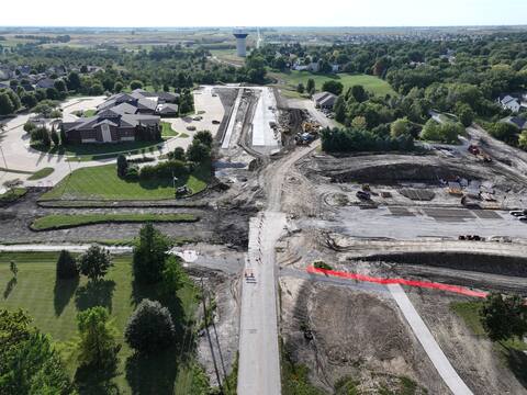 Creek crossing on the University Avenue Extension with new pavement in place