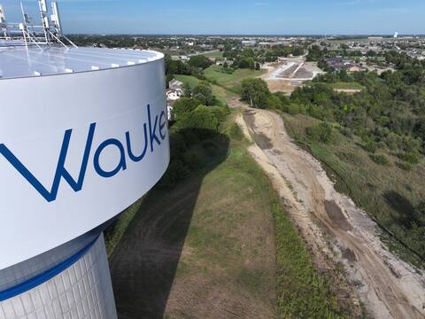 Close pass on the Waukee water tower with the University Avenue Extension corridor beyond