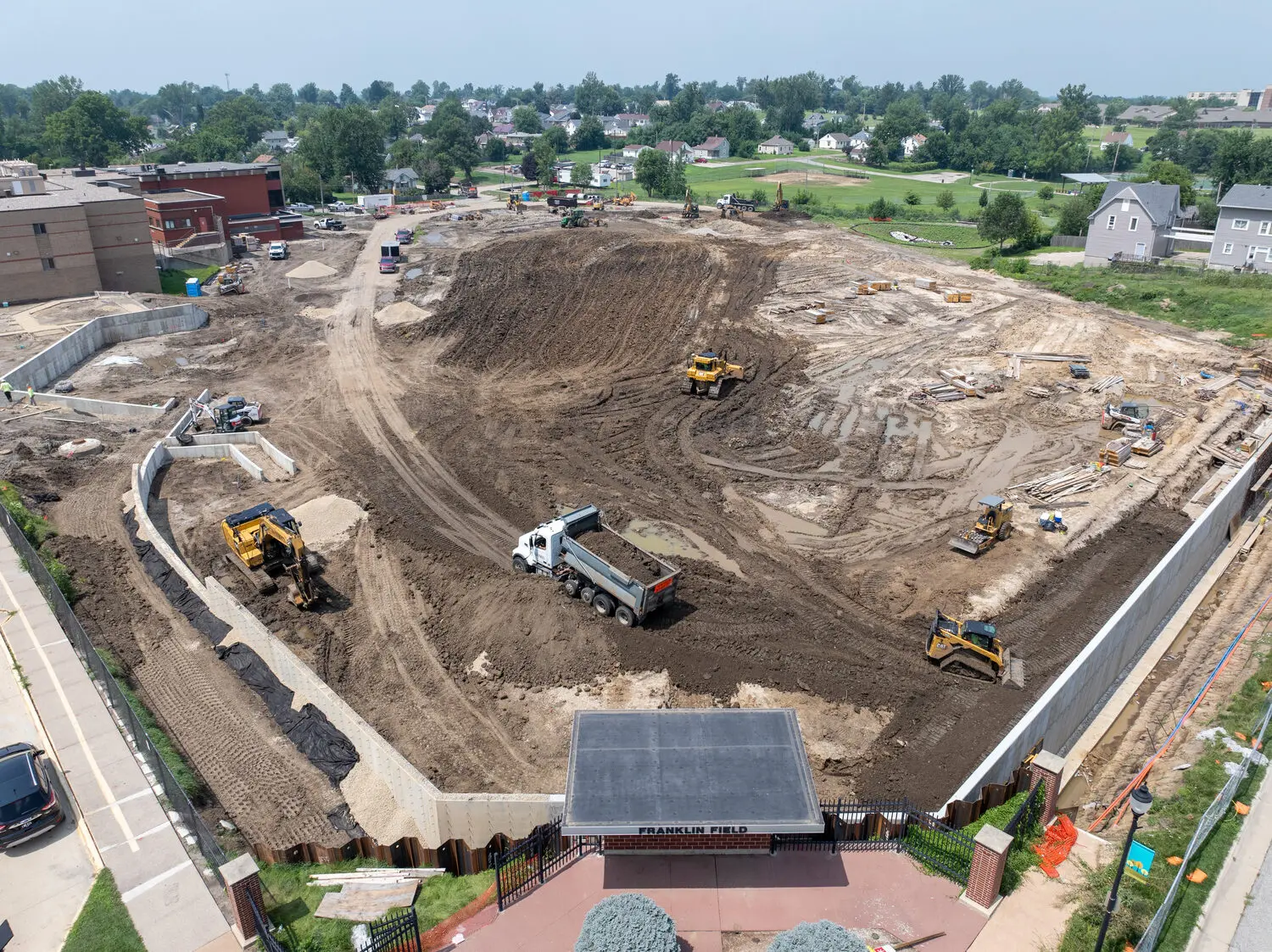 Franklin Field during mass excavation in August 2025, with earthmoving equipment on bare ground